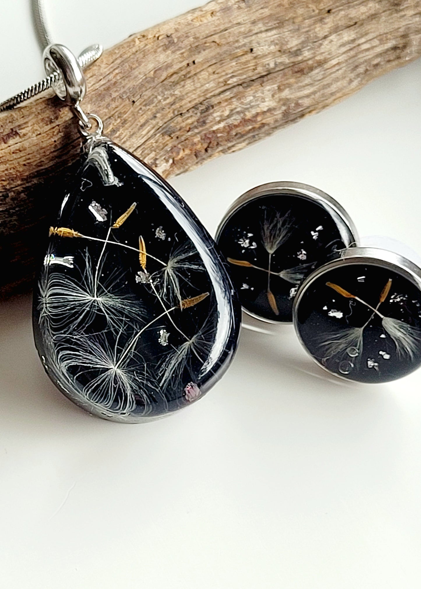 Handmade tear drop dandelion seed necklace. Unique jewelry and gift.