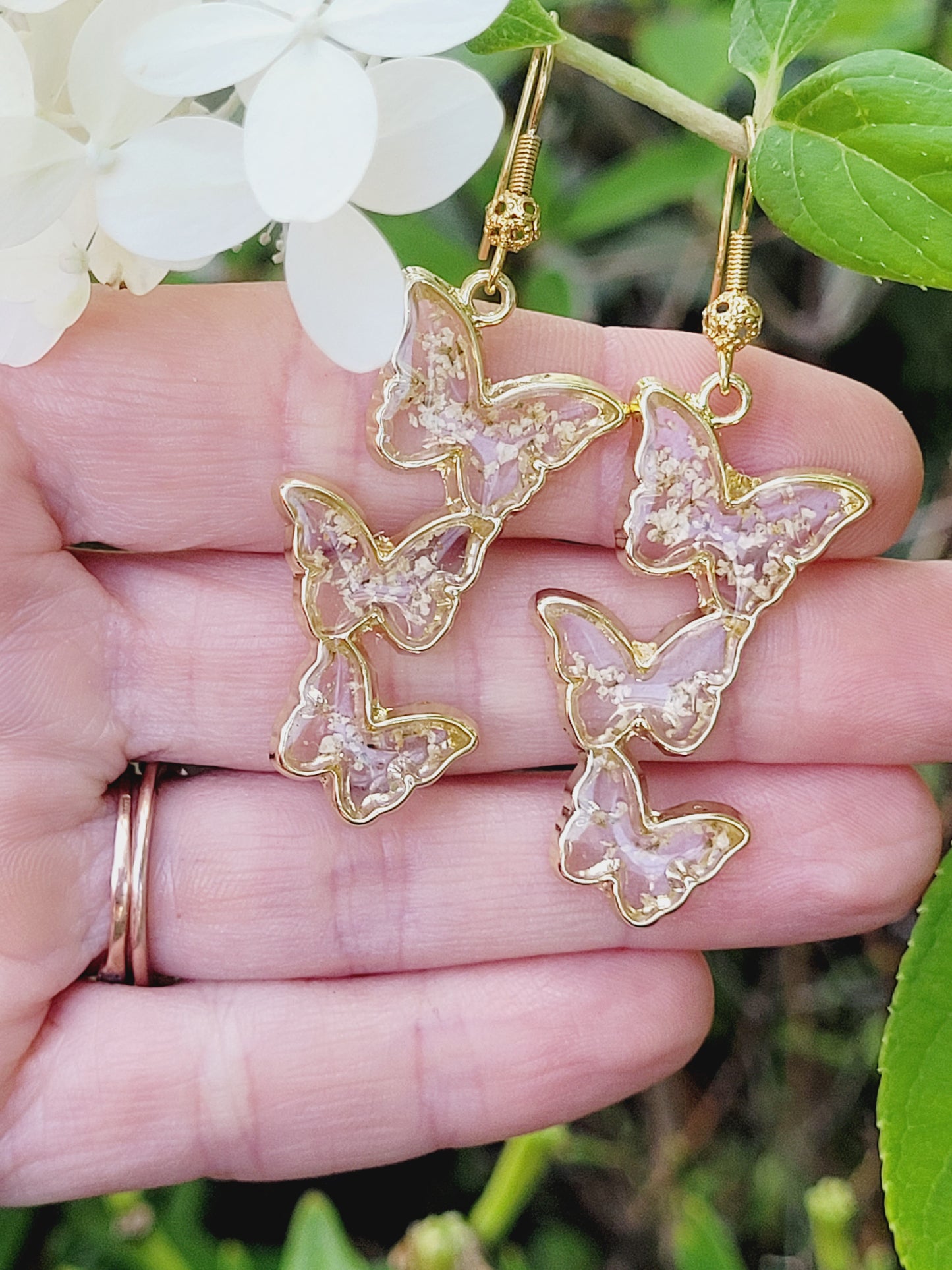 Floral handcrafted butterfly earrings with white wildflowers. Unique Gift. Unique Canadian jewelry