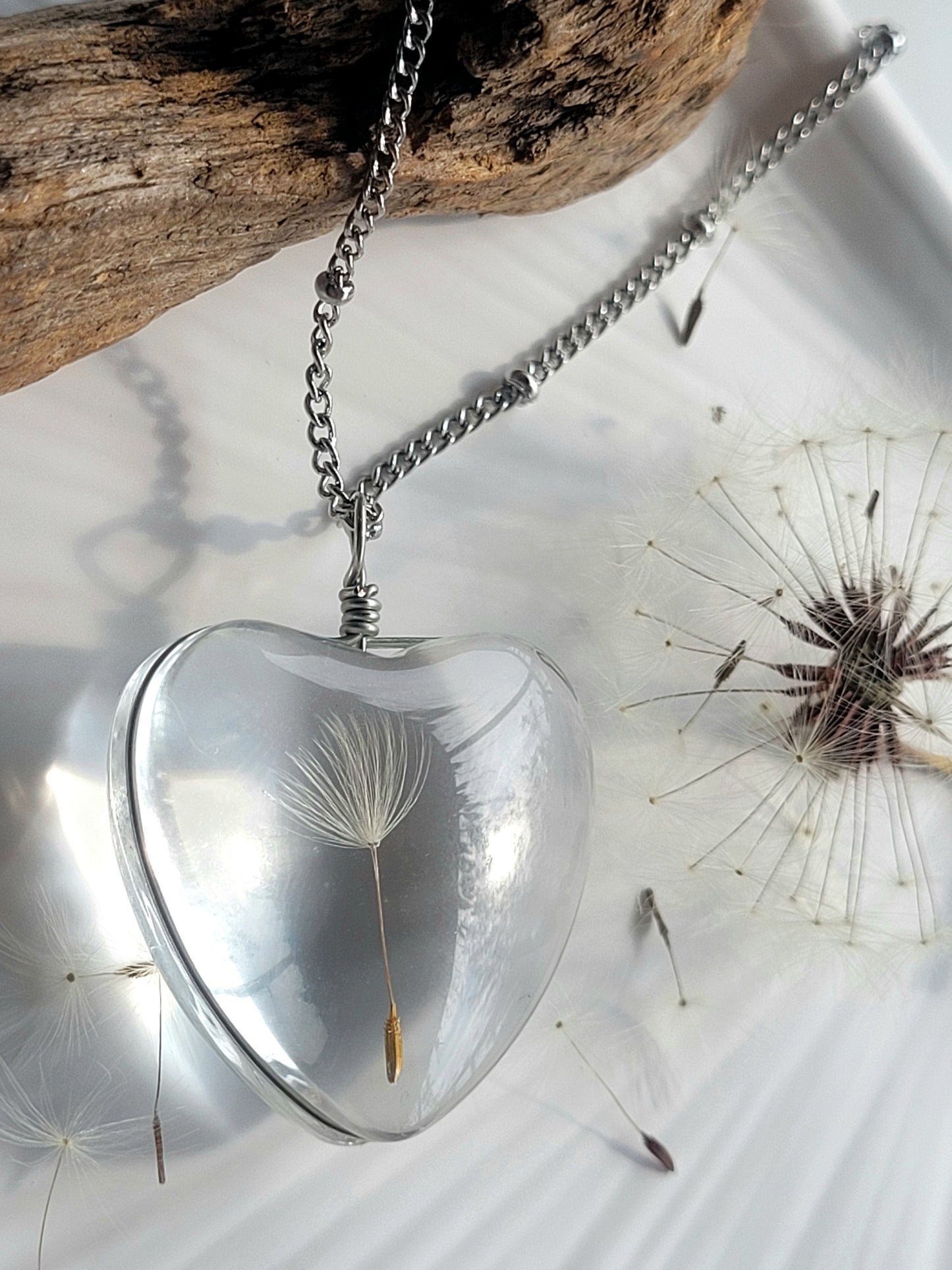 Handmade dandelion heart seed necklace. Unique jewelry and gift.
