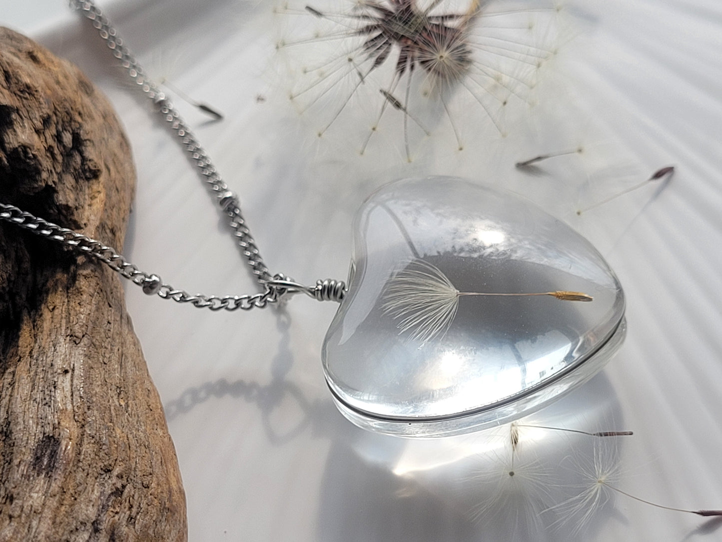 Handmade dandelion heart seed necklace. Unique jewelry and gift.