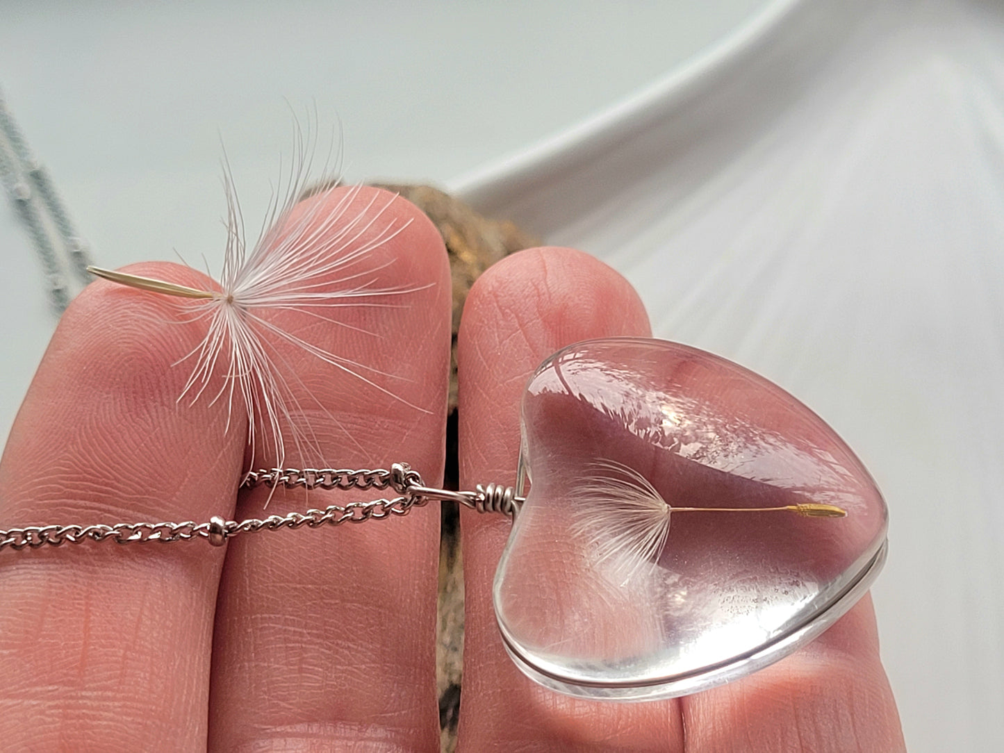 Handmade dandelion heart seed necklace. Unique jewelry and gift.
