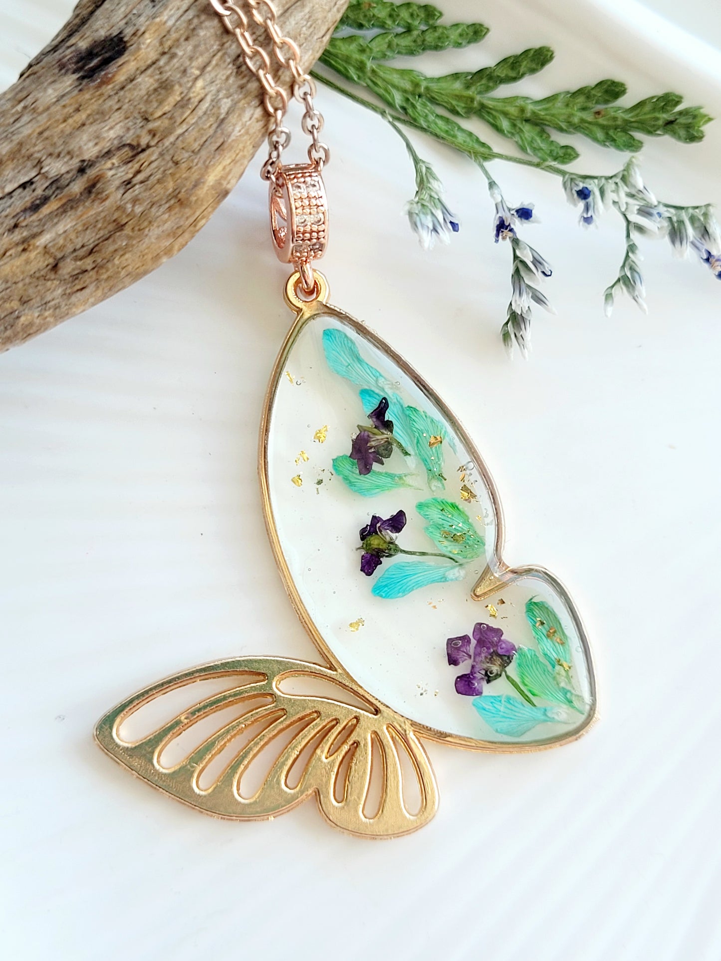 Botanical, handcrafted butterfly necklace with genuine teal genista flowers. Unique gift