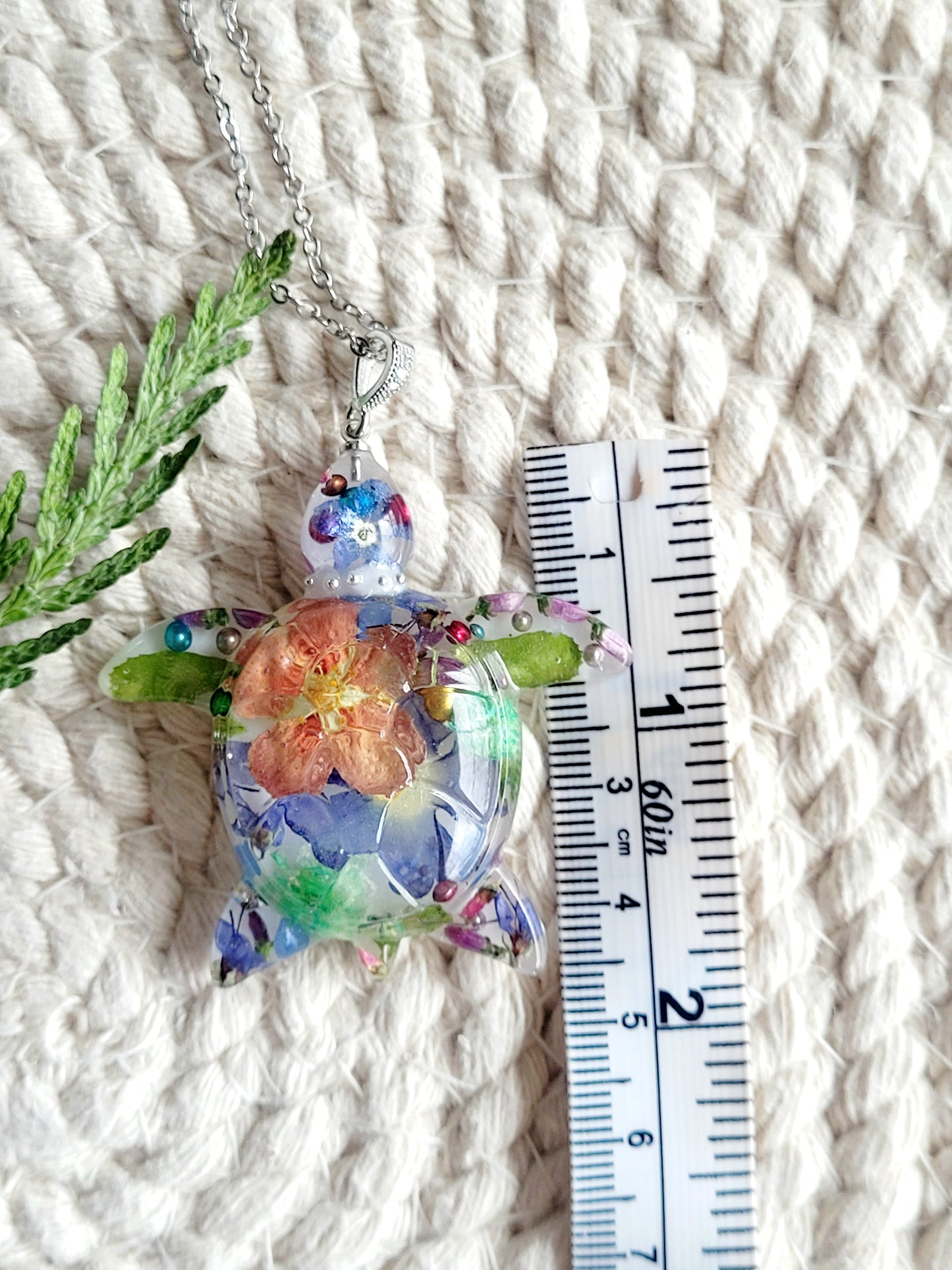Handcrafted floral turtle necklace with real flowers