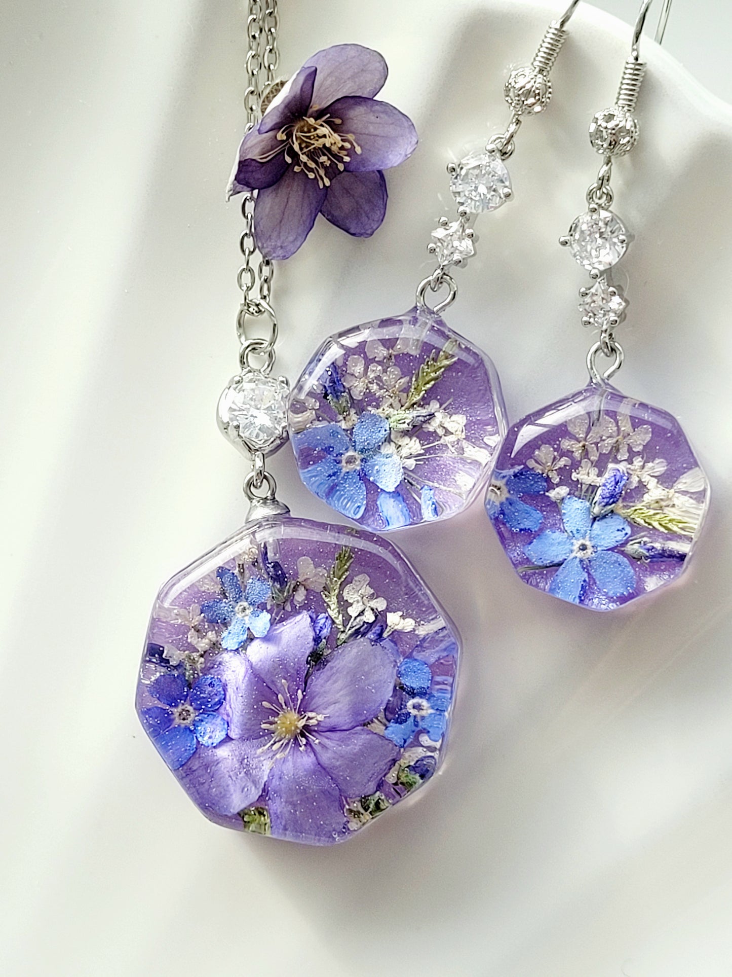 Handcrafted necklace with real flowers foget me not and hepatica