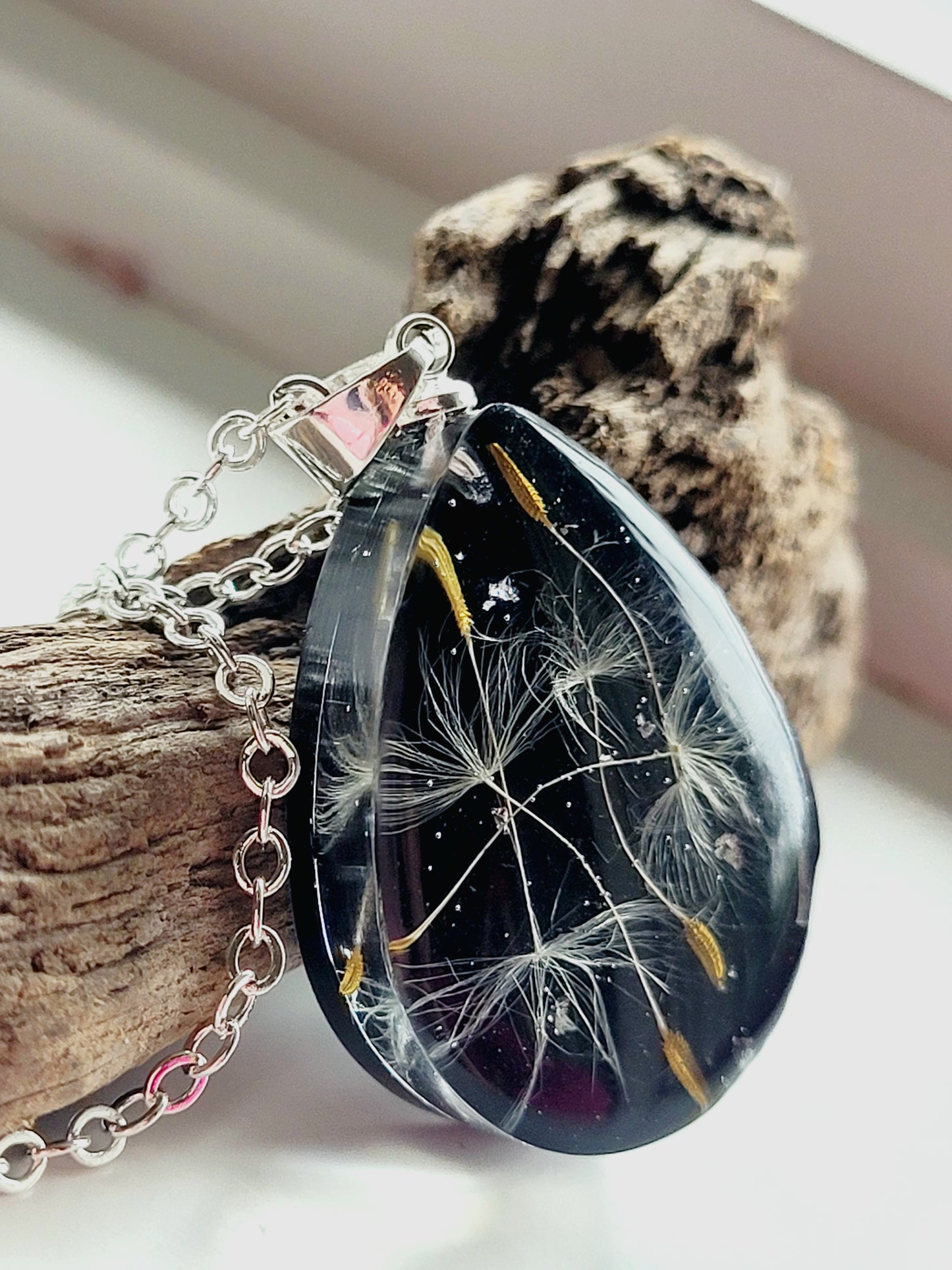 Handmade tear drop dandelion seed necklace. Unique jewelry and gift.