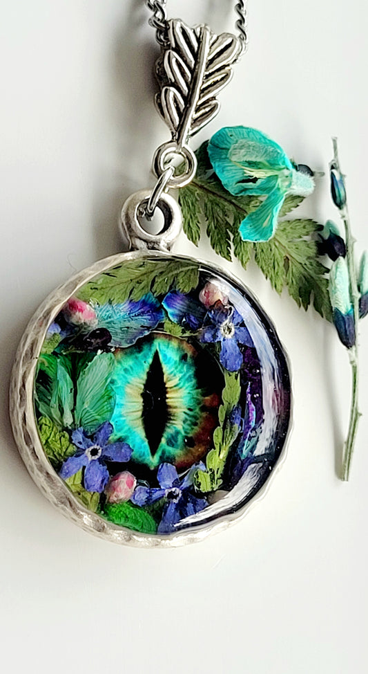 Floral dragon eye framed necklace. Real foget me not flowers. Dragon necklace. Game of thrones