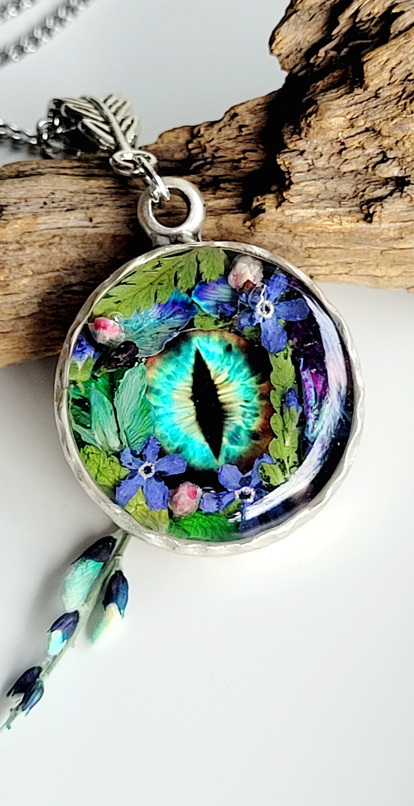 Floral dragon eye framed necklace. Real foget me not flowers. Dragon necklace. Game of thrones