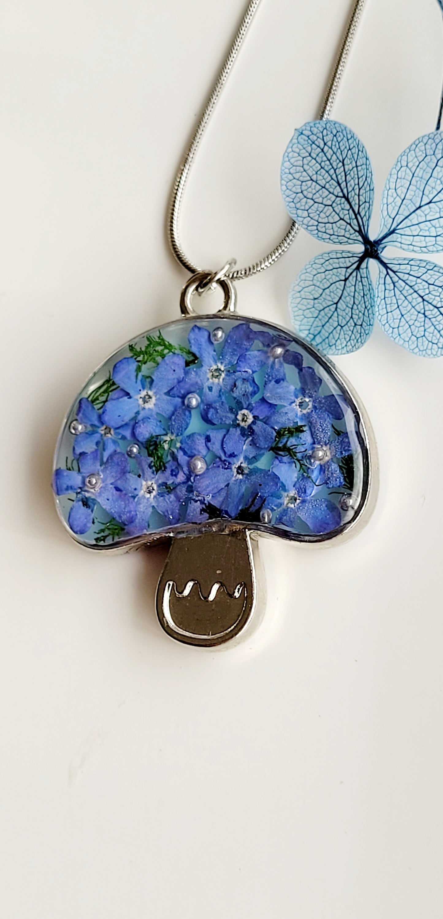 Mushroom necklace with genuine forget me nots