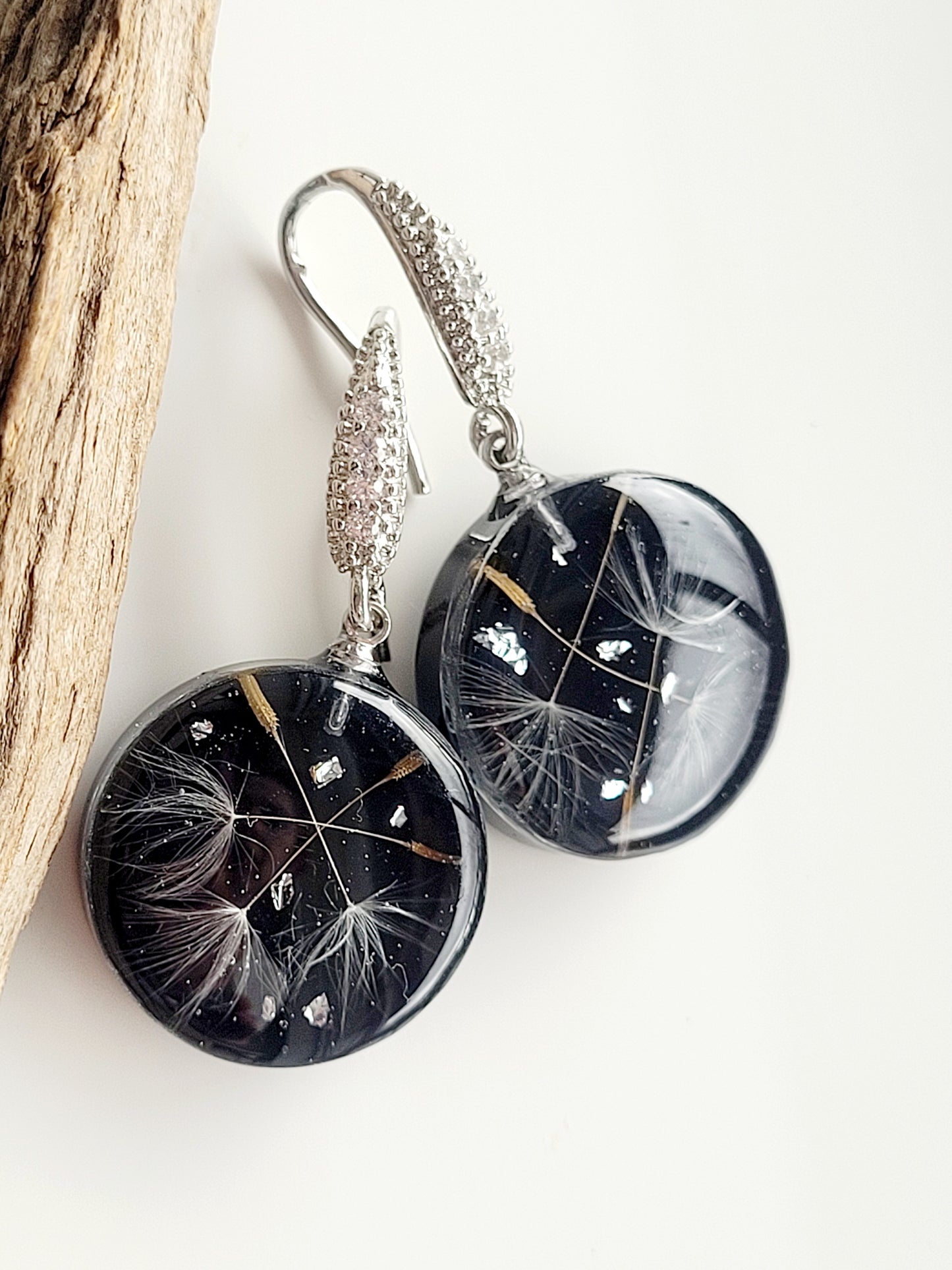 Round dandelion seed earrings. Handcrafted earrings with dandelion seeds. Elegant ad stylish light handmade earrings