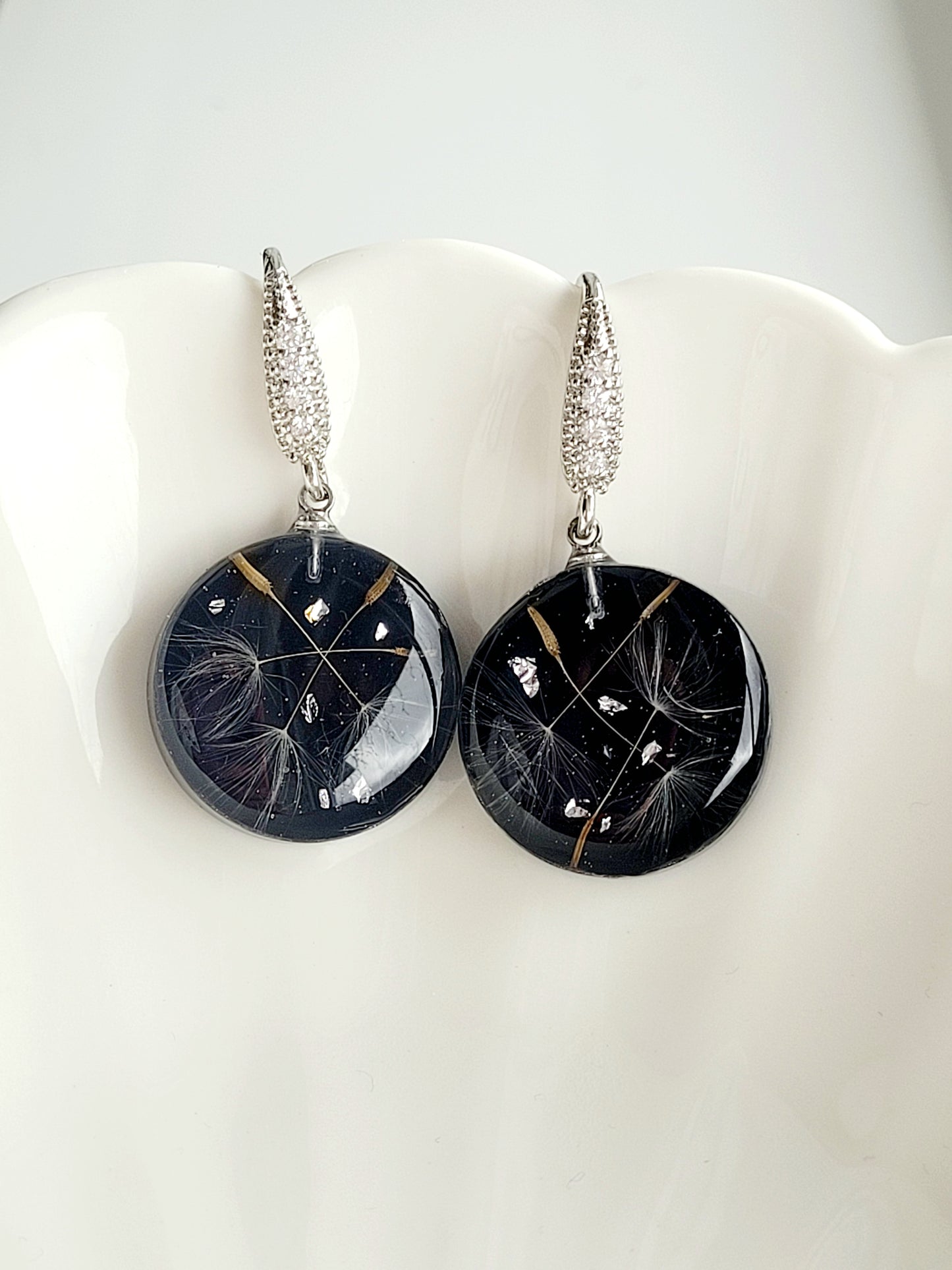Round dandelion seed earrings. Handcrafted earrings with dandelion seeds. Elegant ad stylish light handmade earrings