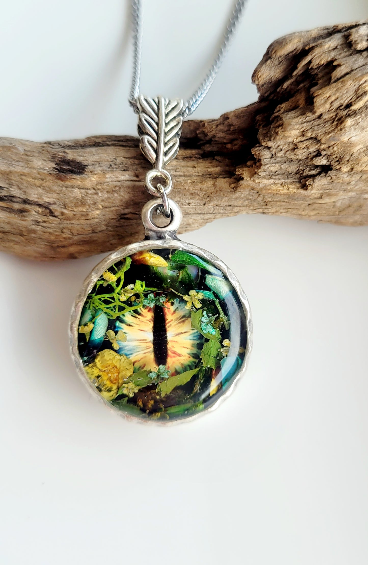 Floral dragon eye framed necklace. Real genista flowers. Dragon necklace. Game of thrones