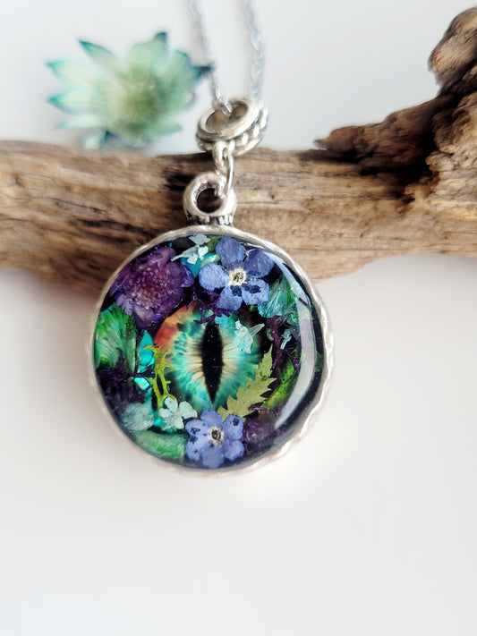 Floral dragon eye framed necklace. Real foget me not flowers. Dragon necklace. Game of thrones