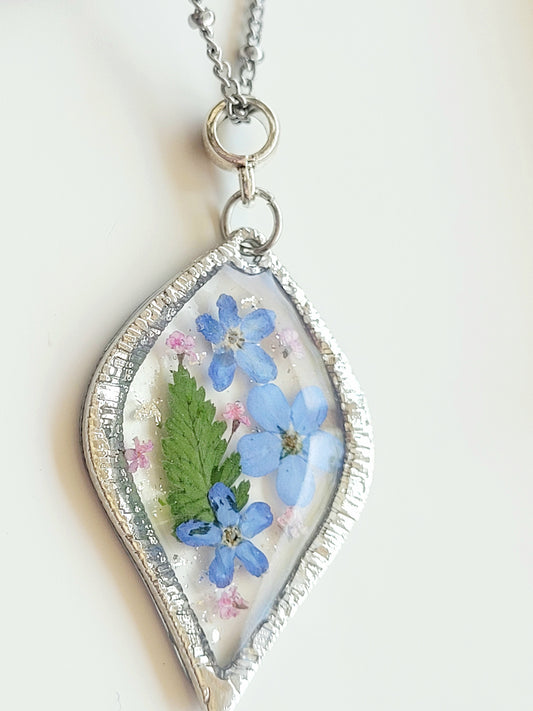 Foget me not handcrafted tear drop necklace with genuine flowers