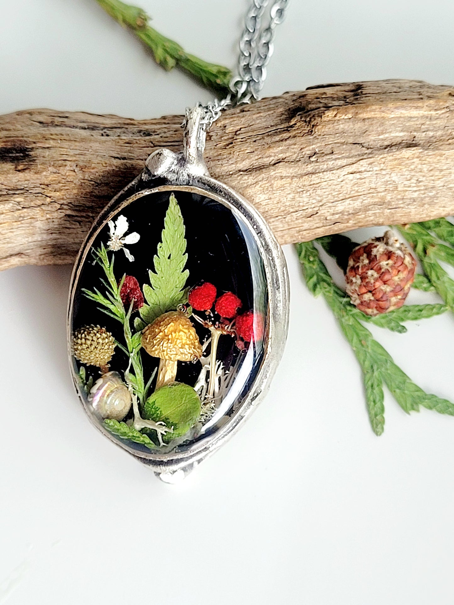 Botanical handcrafted mushroom necklace.