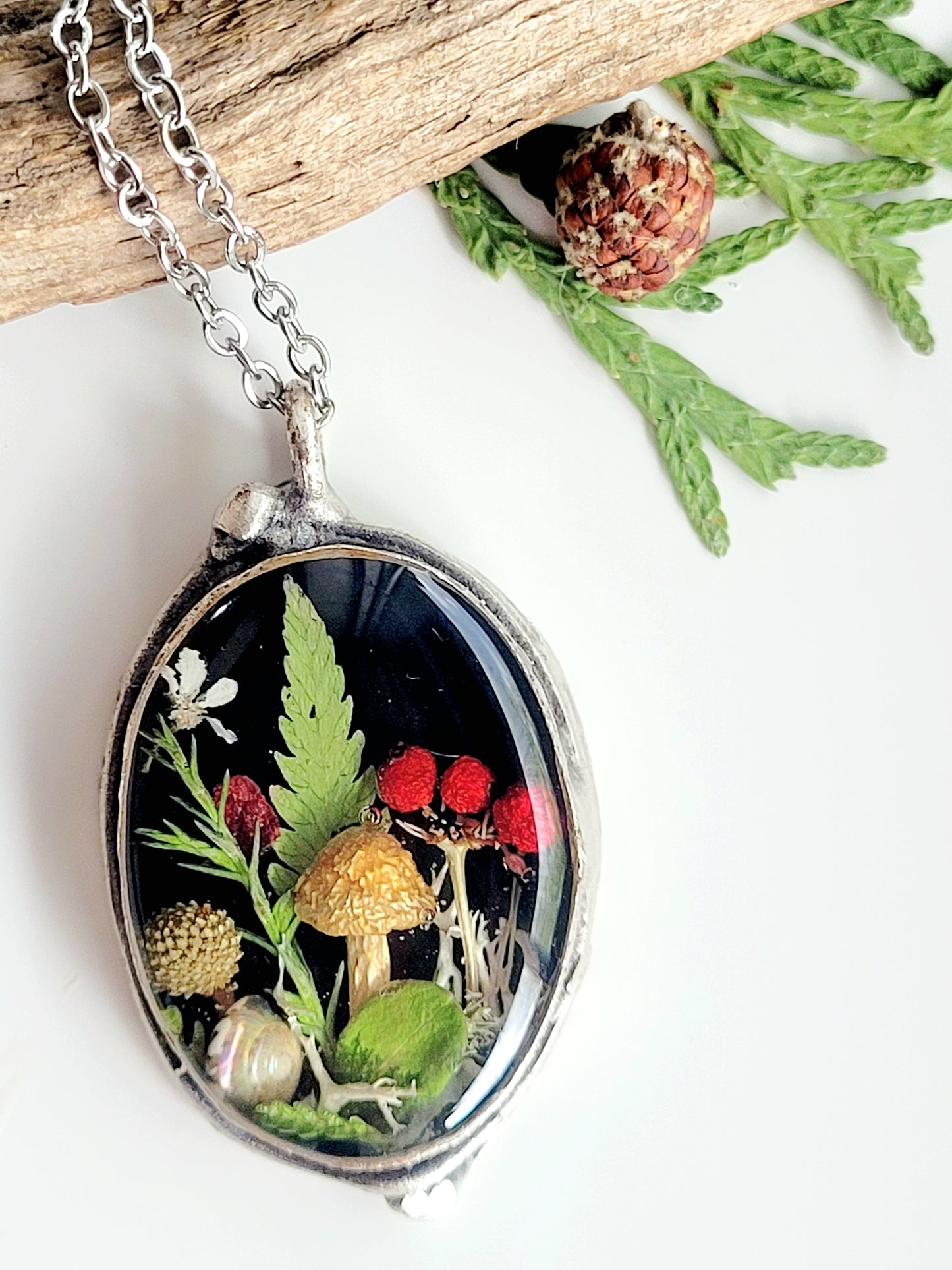 Botanical handcrafted mushroom necklace.