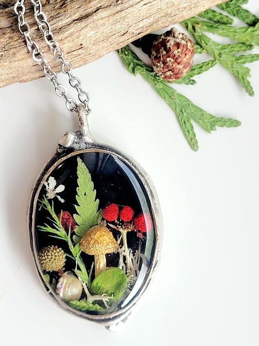 Botanical handcrafted mushroom necklace.