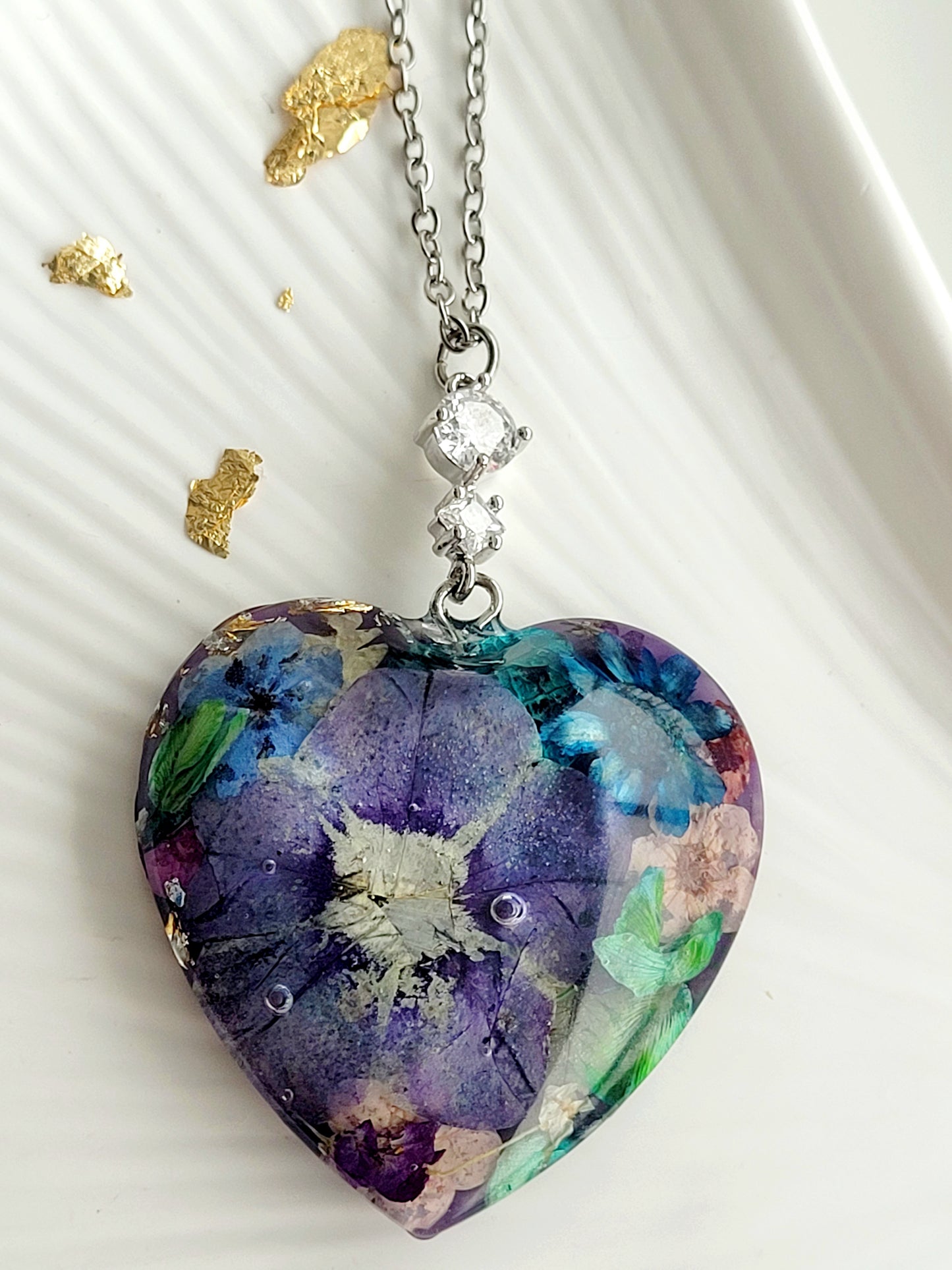 Floral botanical handcrafted heart necklace with genuine petunia flower