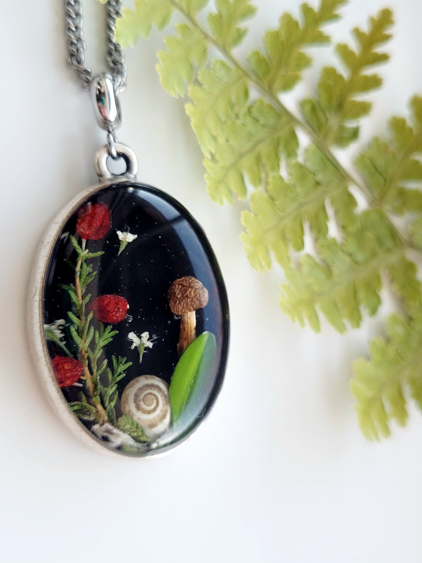 Botanical handcrafted mushroom necklace.