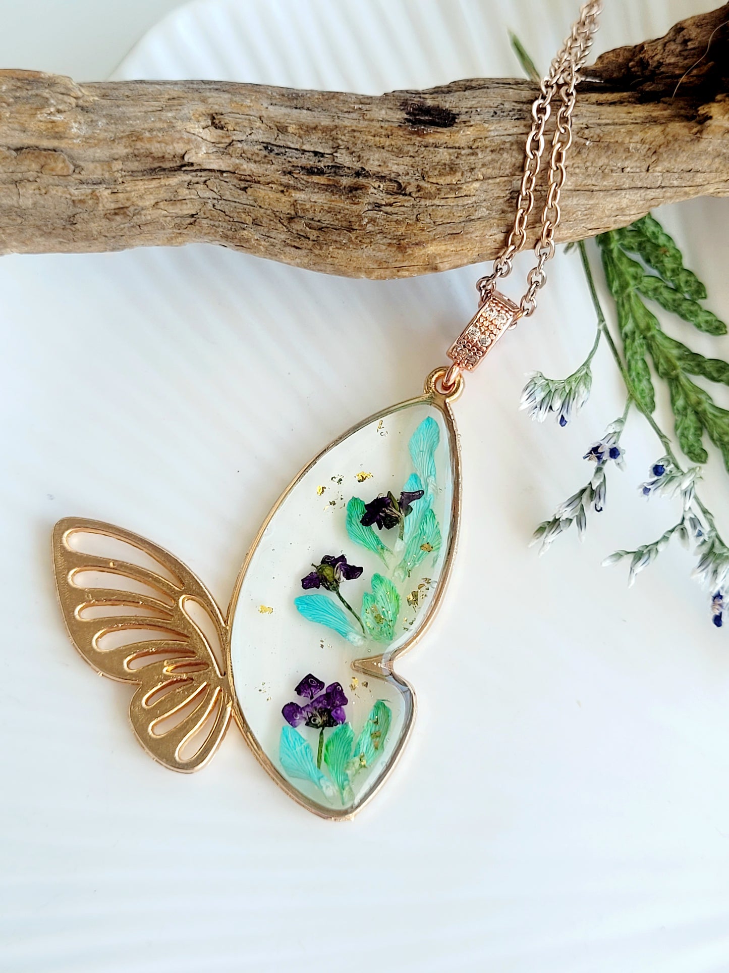 Botanical, handcrafted butterfly necklace with genuine teal genista flowers. Unique gift