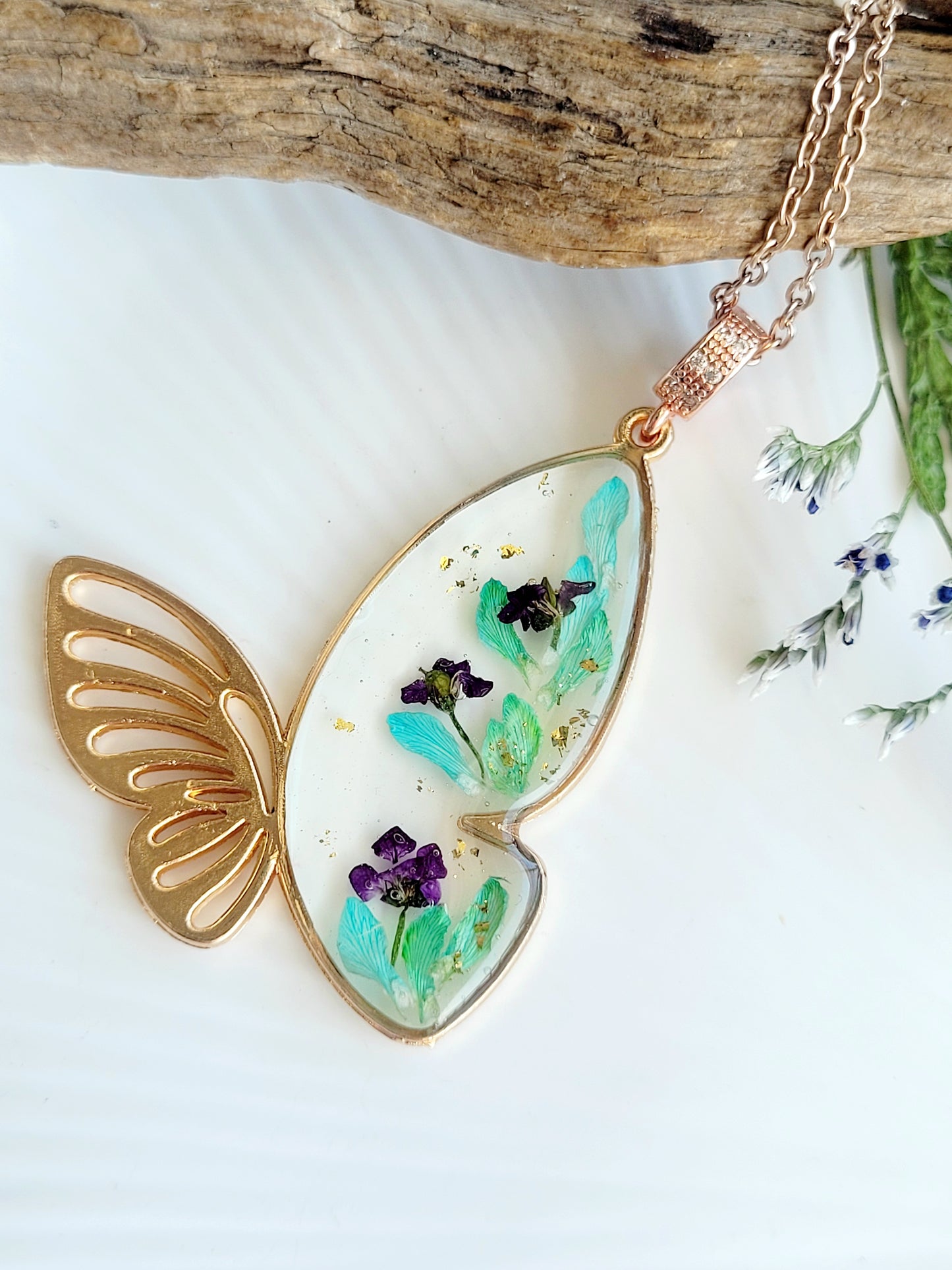 Botanical, handcrafted butterfly necklace with genuine teal genista flowers. Unique gift