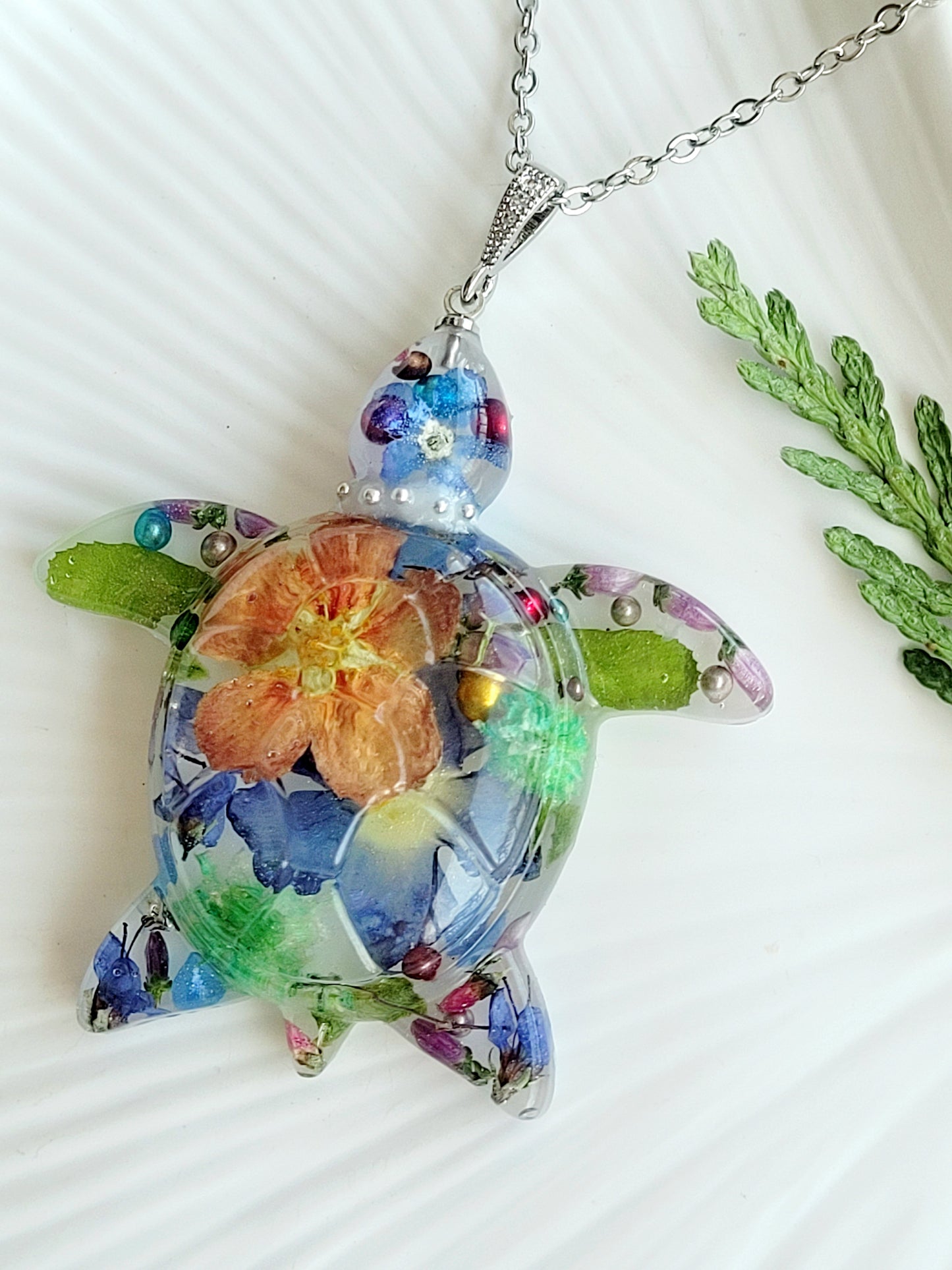 Handcrafted floral turtle necklace with real flowers