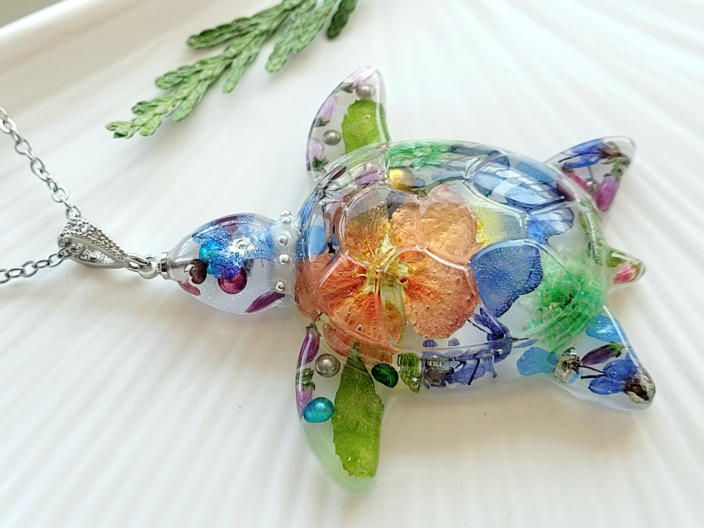 Handcrafted floral turtle necklace with real flowers