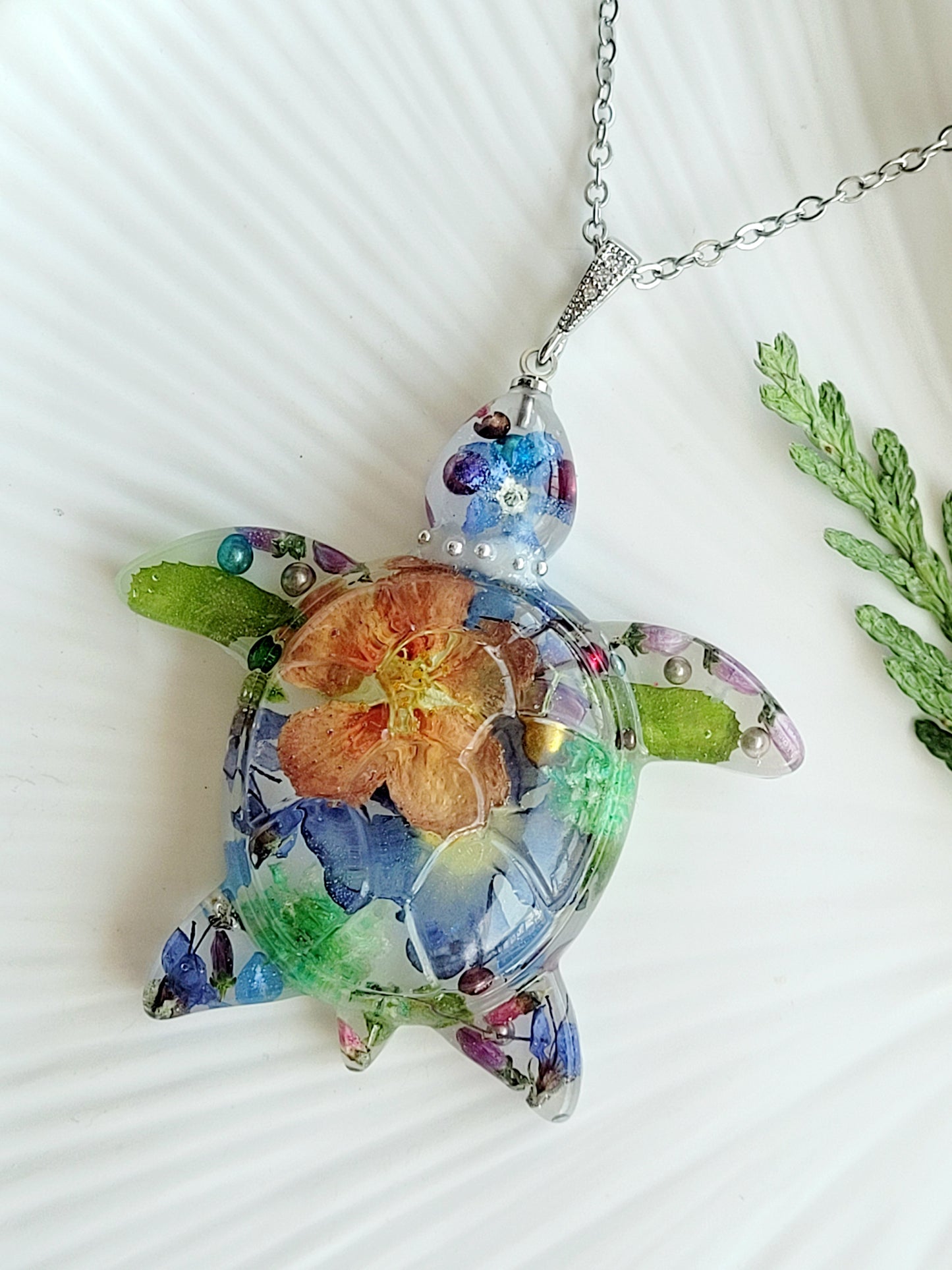Handcrafted floral turtle necklace with real flowers
