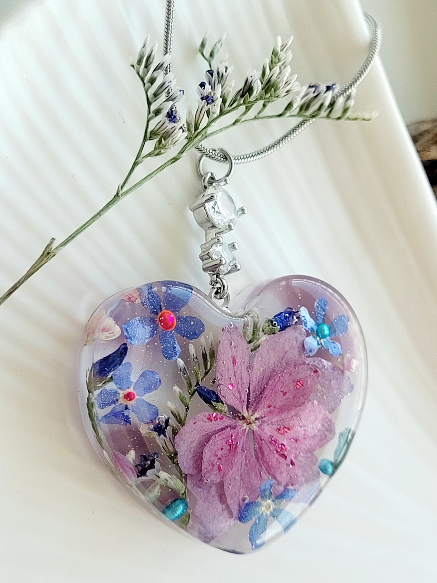 Pink Hydrangea and forget-me-not heart necklace.  Handmade real flower jewelry. Canadian handcrafted jewelry. Unique gift and jewelry