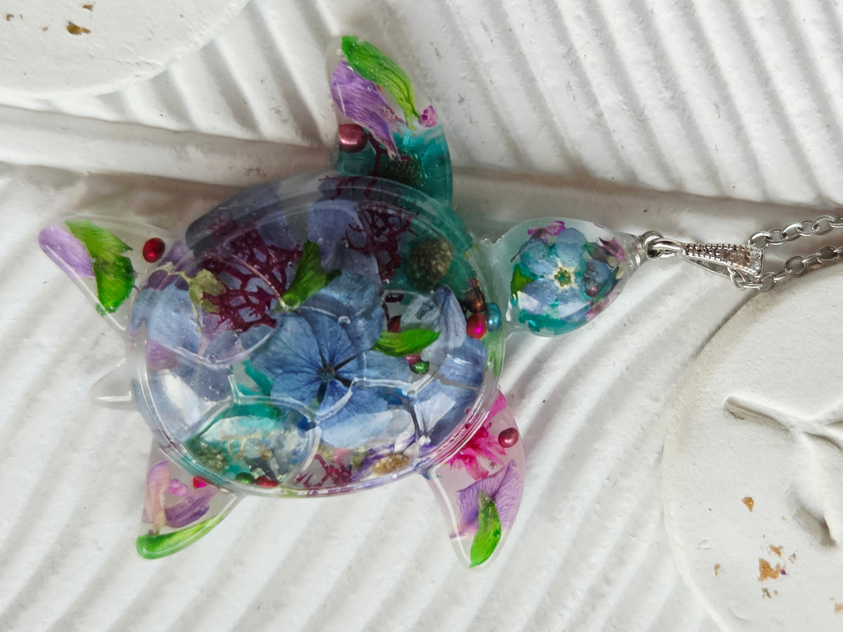 Handcrafted floral turtle necklace with real flowers