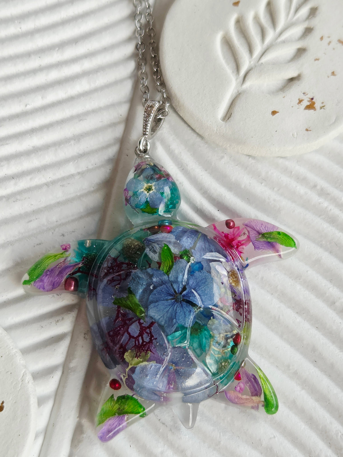 Handcrafted floral turtle necklace with real flowers