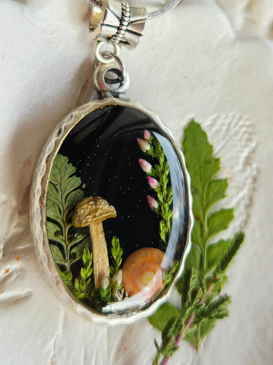 Botanical handcrafted mushroom necklace.