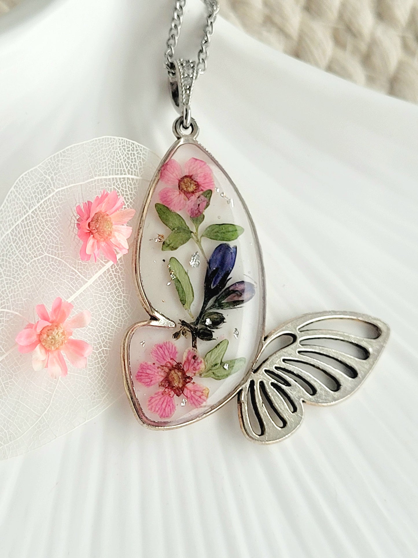 Botanical, handcrafted butterfly necklace with genuine blue bell and wildflowers. Unique gift