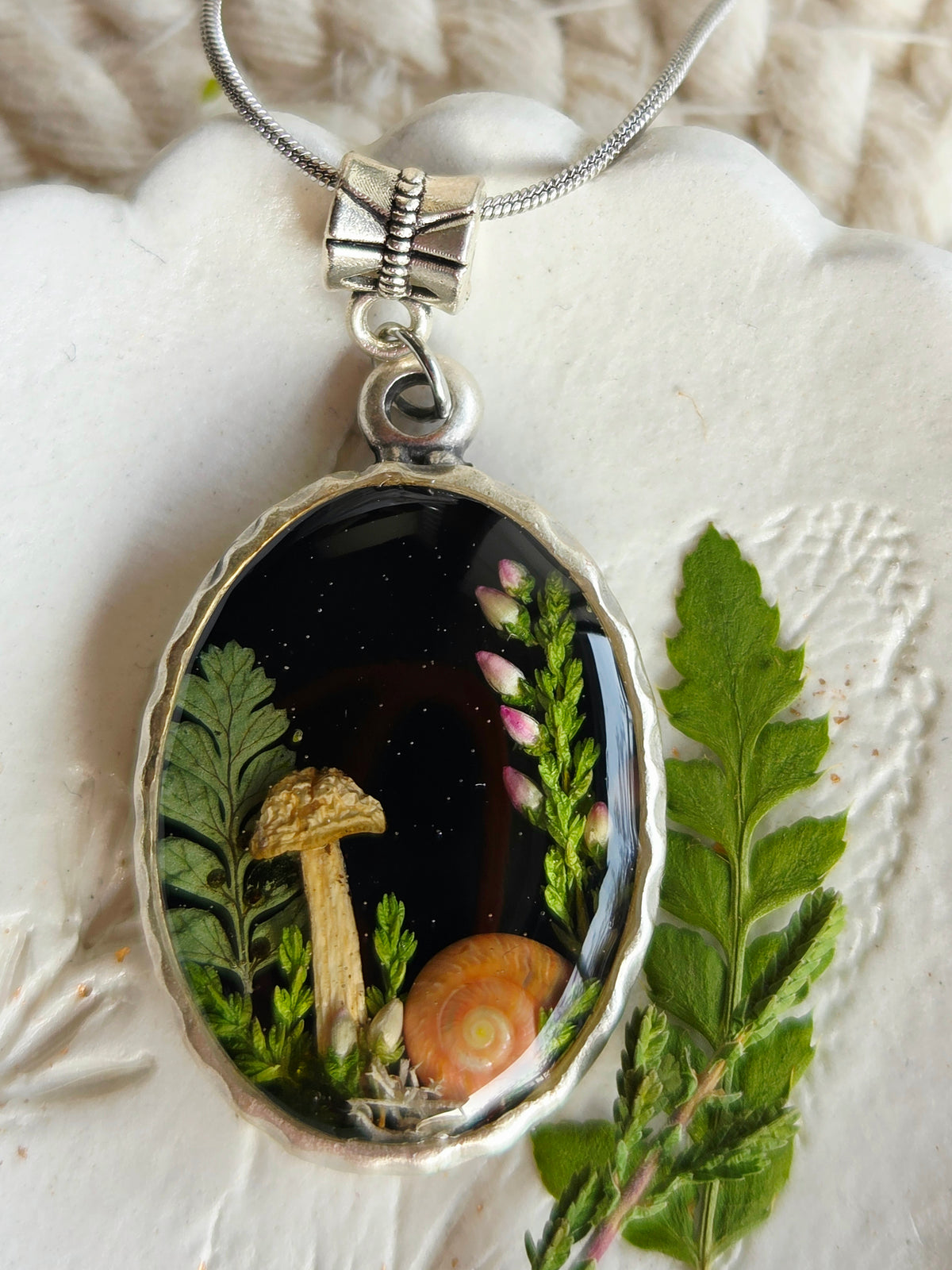 Botanical handcrafted mushroom necklace.