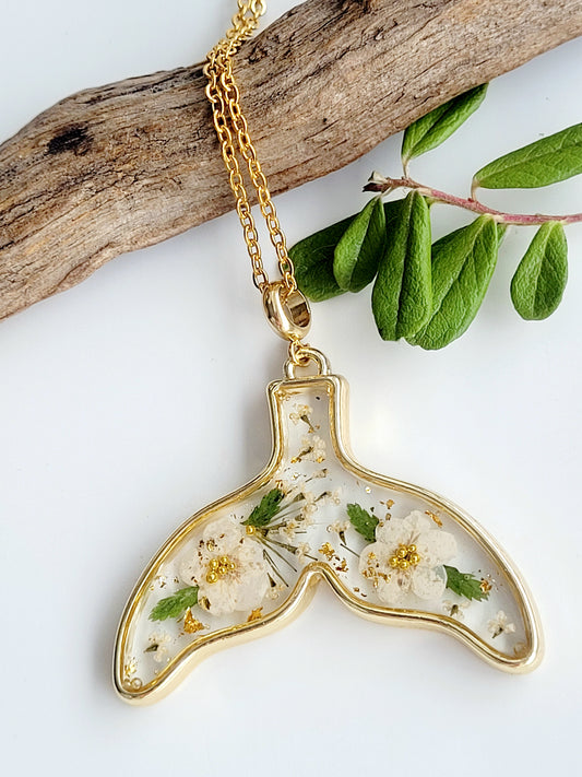 Floral whale tail necklace with genuine flowers