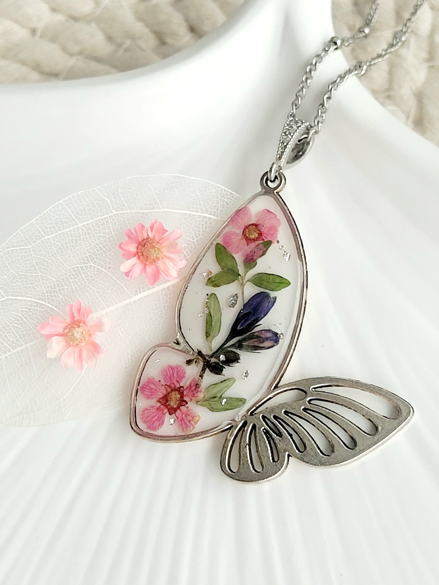 Botanical, handcrafted butterfly necklace with genuine blue bell and wildflowers. Unique gift