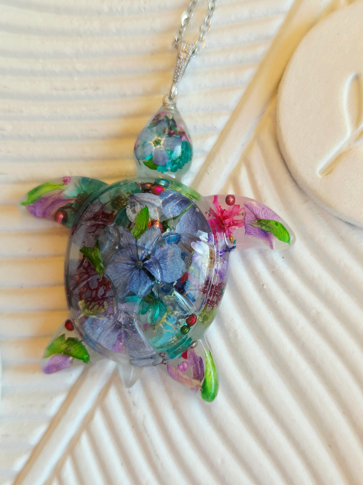Handcrafted floral turtle necklace with real flowers