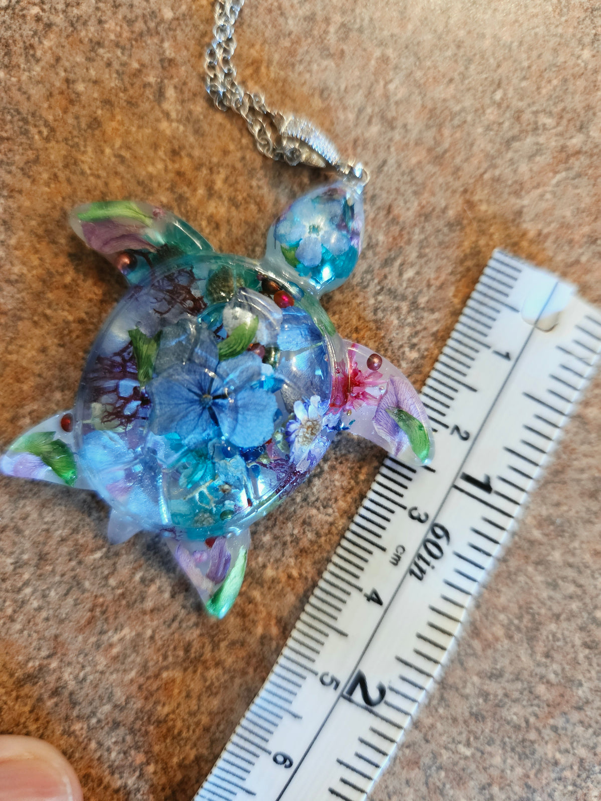 Handcrafted floral turtle necklace with real flowers
