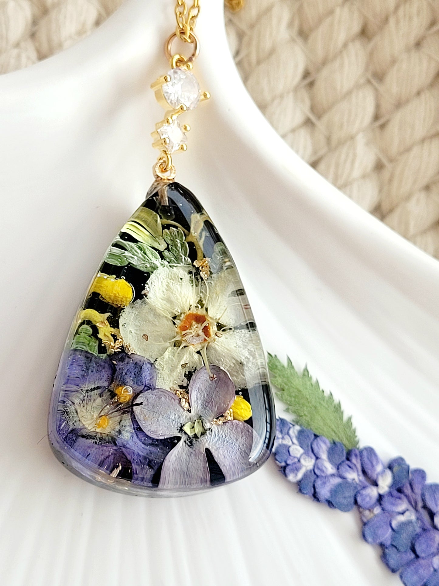 Floral handcrafted tear drop necklace with genuine crabapple and lilac flower