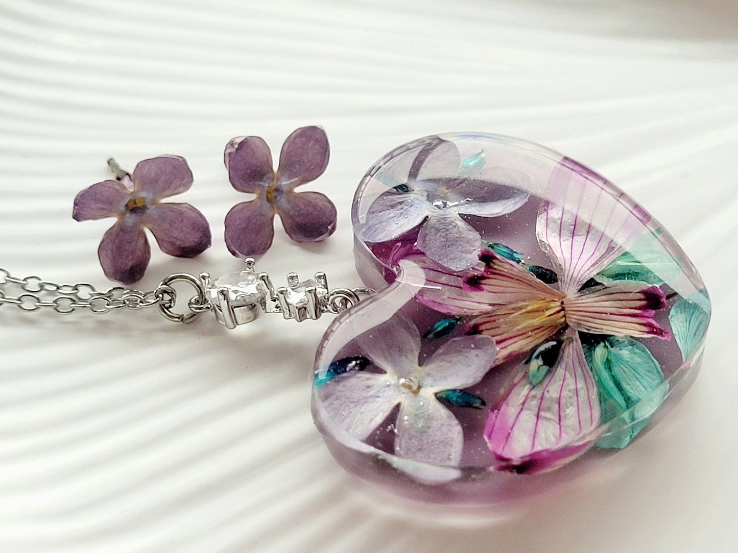 Floral handcrafted heart necklace with genuine snowdrop and lilac flowers