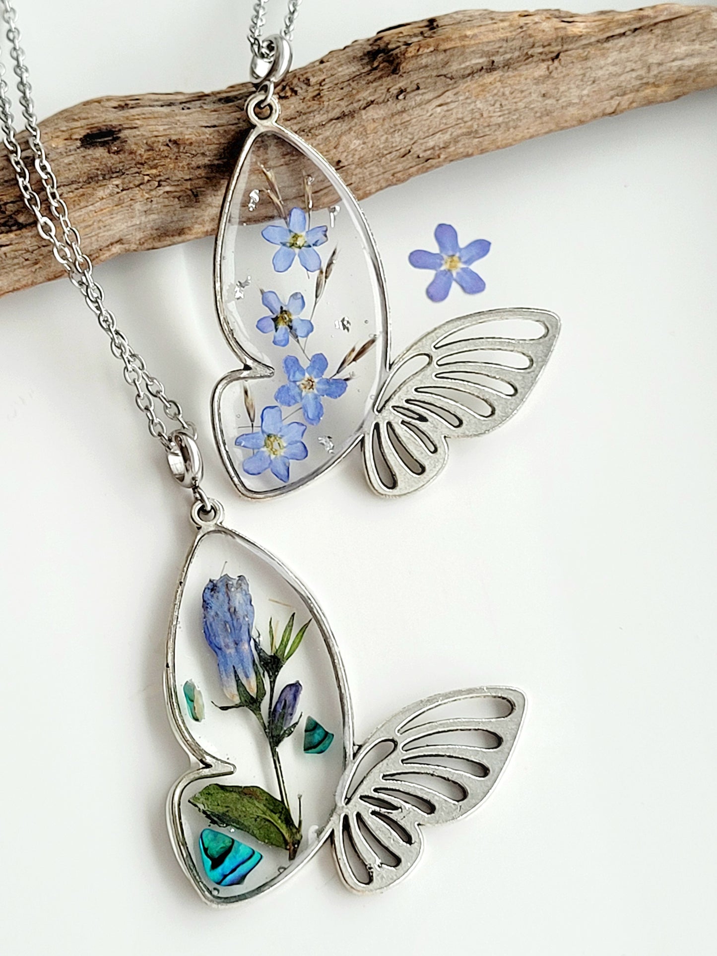 Butterfly necklace with foget me not flowers