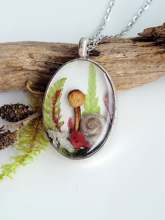 Botanical handcrafted mushroom necklace.