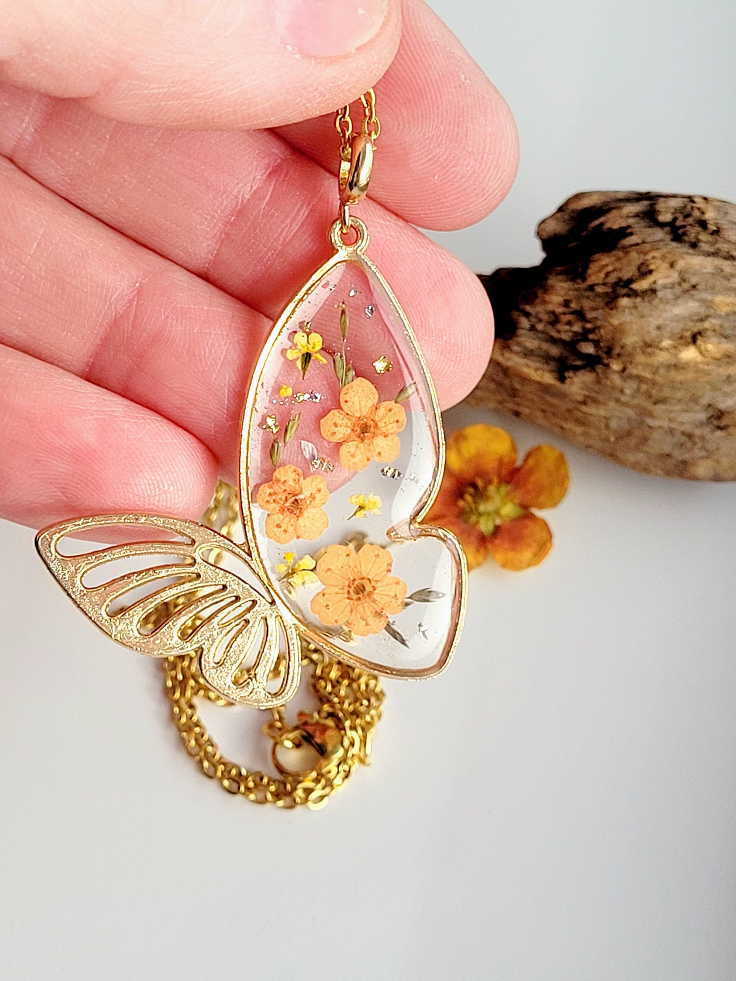 Botanical, handcrafted orange butterfly necklac with genuine flowers. Unique gift