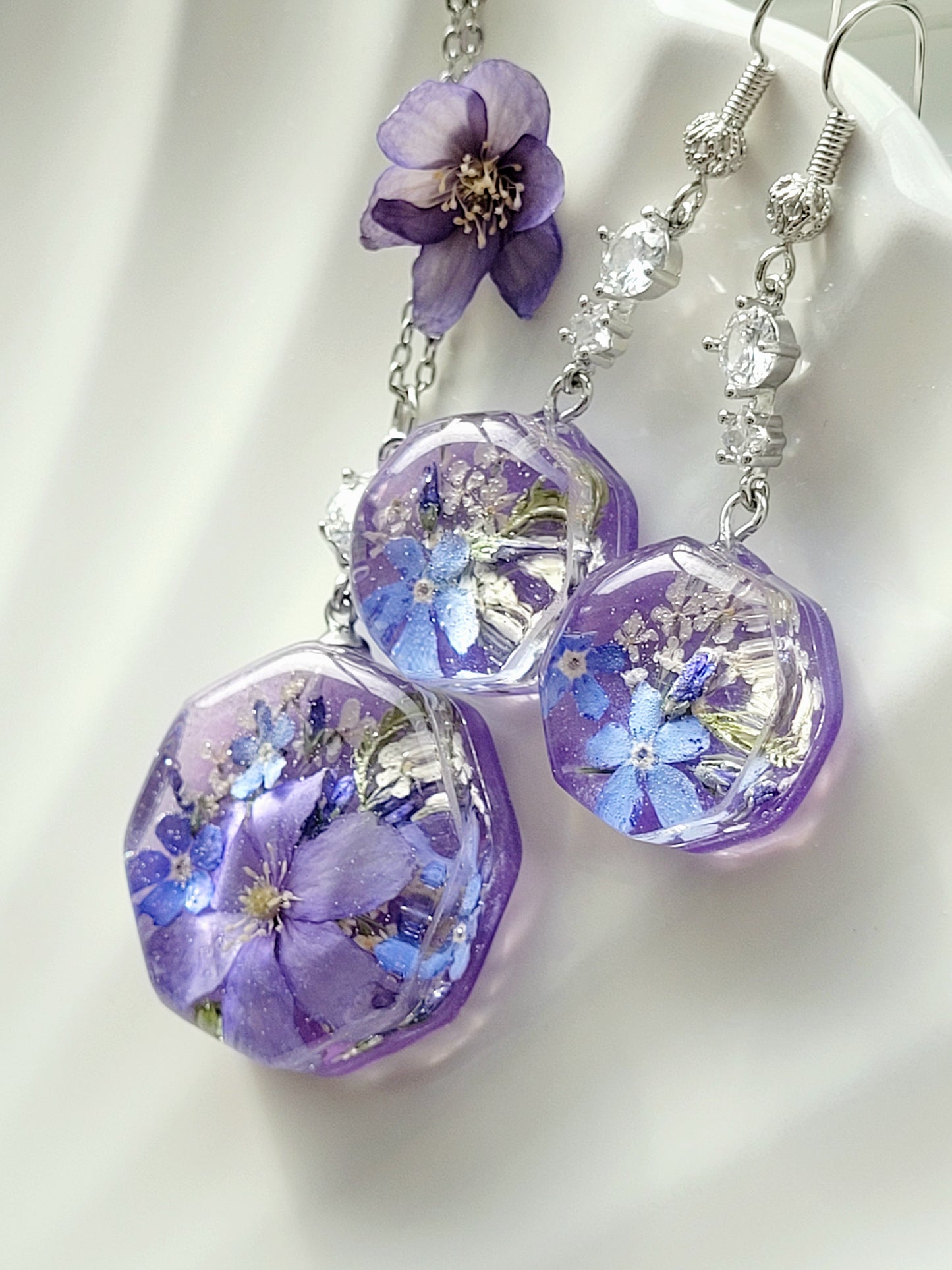 Handcrafted necklace with real flowers foget me not and hepatica